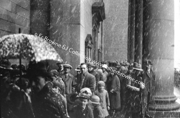 CROWDS IN SNOW OUTSIDE GARDINER STREET CHURCH S.J.